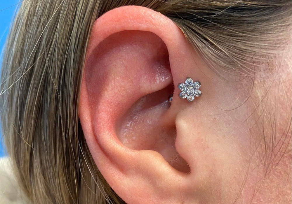Forward helix ear piercing by Silver Lining in Manchester