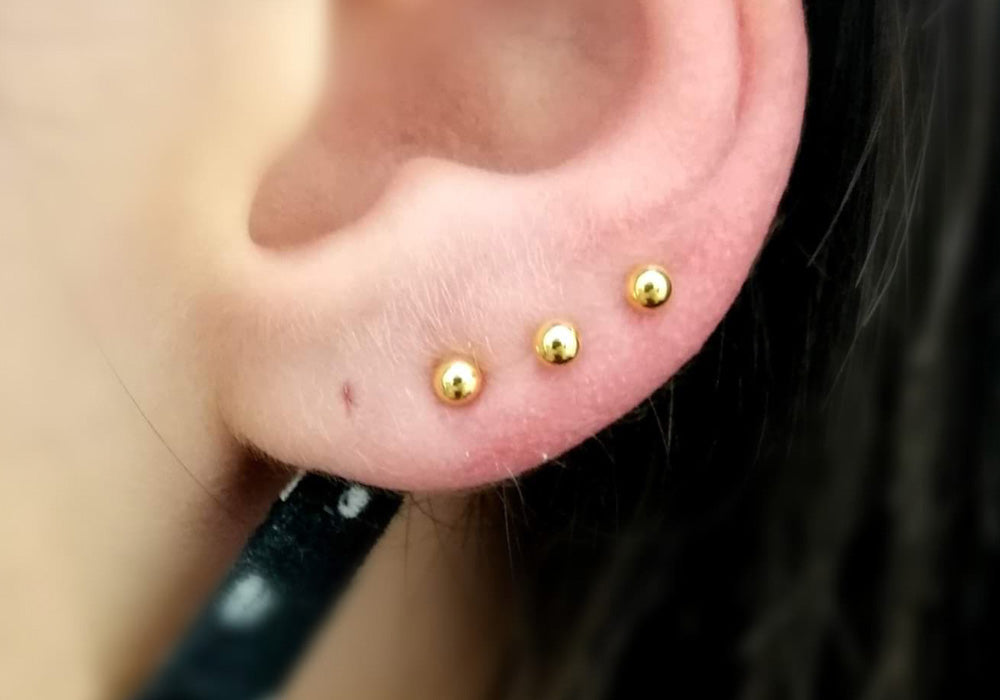 Lobe ear piercing by Silver Lining in Manchester